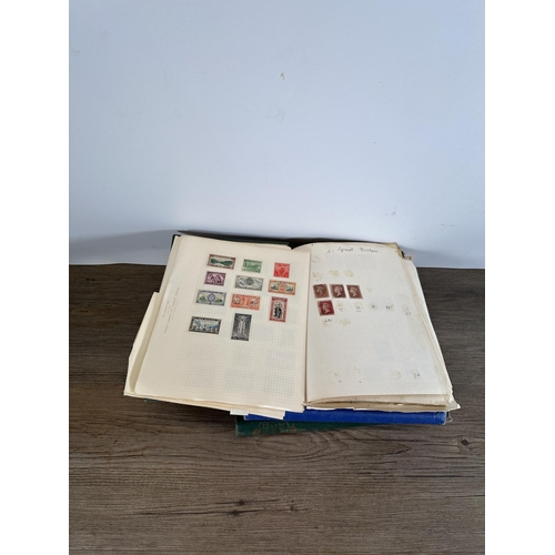 549 - Six albums containing a collection of worldwide stamps