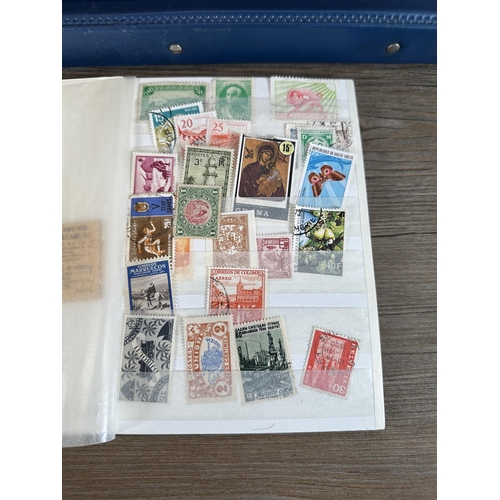 551 - Six albums containing a collection of worldwide stamps