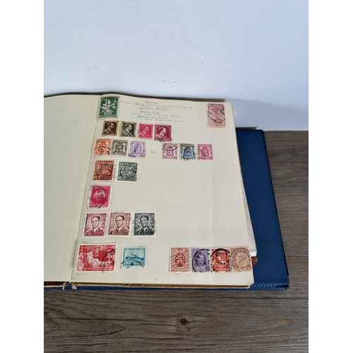 551 - Six albums containing a collection of worldwide stamps