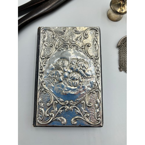 2379 - Eight silver items to include hallmarked London silver fronted address book, .800 silver chainmail l... 