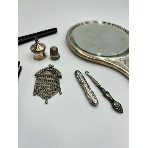 2379 - Eight silver items to include hallmarked London silver fronted address book, .800 silver chainmail l... 