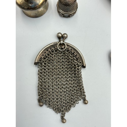 2379 - Eight silver items to include hallmarked London silver fronted address book, .800 silver chainmail l... 