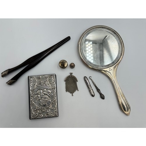 2379 - Eight silver items to include hallmarked London silver fronted address book, .800 silver chainmail l... 