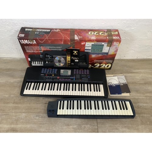 718 - Two keyboards, one Studiologic CMK149 MIDI controller with Piano Suite Premier software disc with in... 