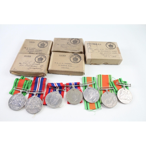 2304 - Seven WWII medals and five WWII postage boxes