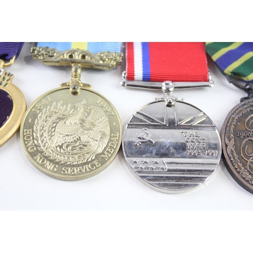 2316 - Seven military medals to include Purple Heart, Cold War, RAF Warma, Hong Kong Service, French etc.