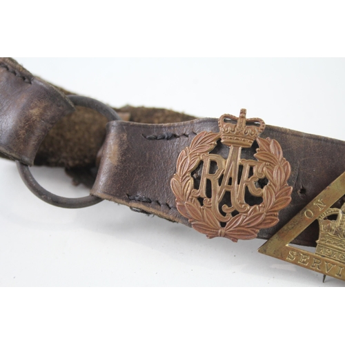 2319 - A vintage Boy Scouts brown leather Belt complete with badges to include military cap badges, His Mas... 