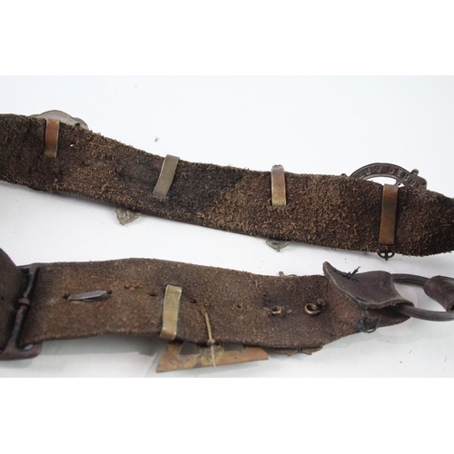 2319 - A vintage Boy Scouts brown leather Belt complete with badges to include military cap badges, His Mas... 