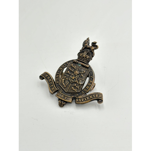 2324 - A WWI period Kings College Wimbledon School cap badge