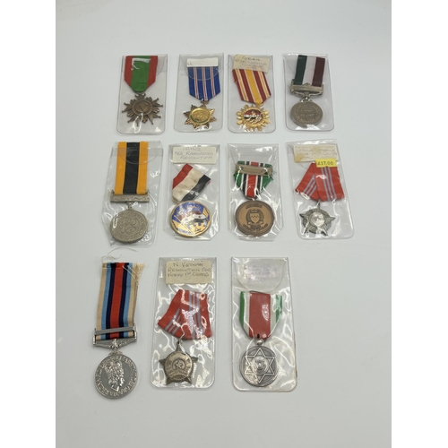 2335 - Eleven Middle Eastern military medals to include Syrian 10 Years Service, Iraq 1963 Ramadhan Revolut... 