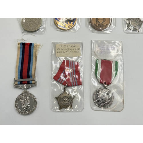 2335 - Eleven Middle Eastern military medals to include Syrian 10 Years Service, Iraq 1963 Ramadhan Revolut... 