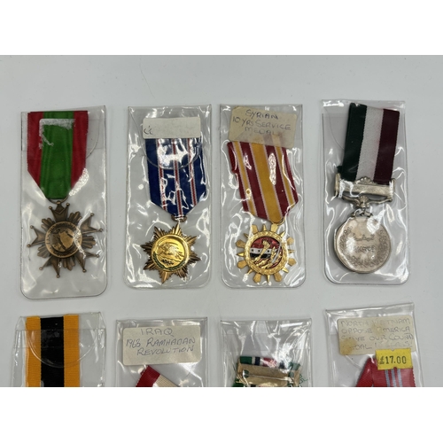 2335 - Eleven Middle Eastern military medals to include Syrian 10 Years Service, Iraq 1963 Ramadhan Revolut... 