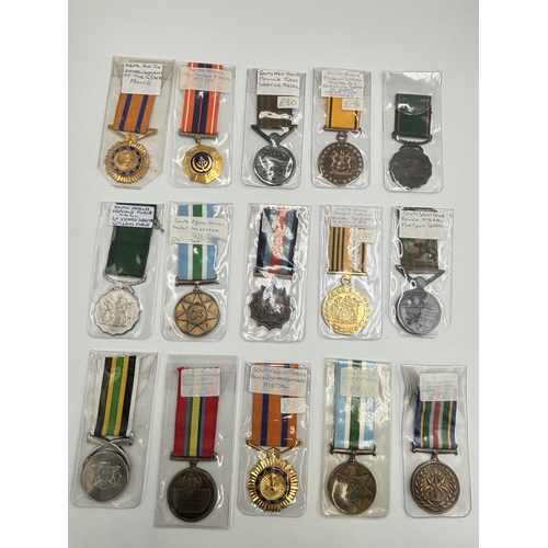 2340 - Fifteen South African military and police medals to include Good Service, Defence Force 20 Years Ser... 