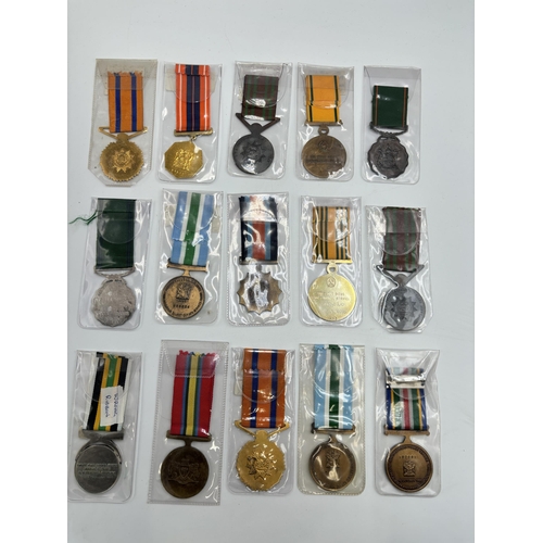 2340 - Fifteen South African military and police medals to include Good Service, Defence Force 20 Years Ser... 