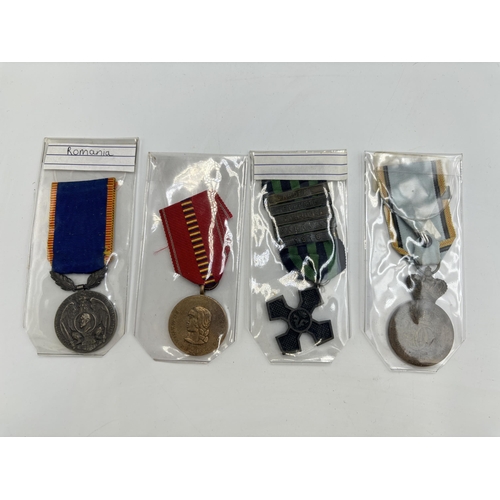 2341 - Four Romanian military medals to include King Carol Centenary, 1916-1918 Commemorative Cross etc.