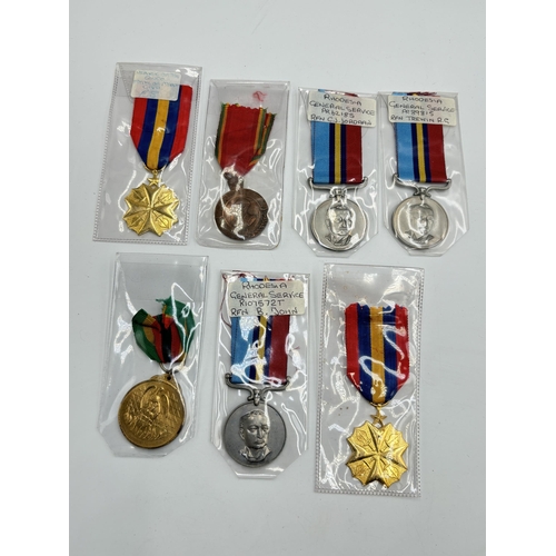 2344 - Seven African military medals to include Rhodesian General Service presented to R107572T RFN. B. Joh... 