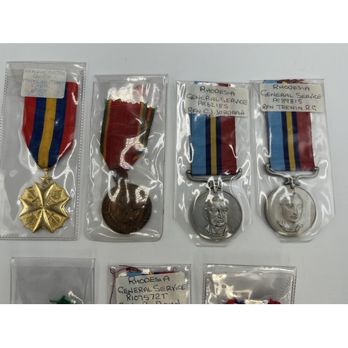 2344 - Seven African military medals to include Rhodesian General Service presented to R107572T RFN. B. Joh... 