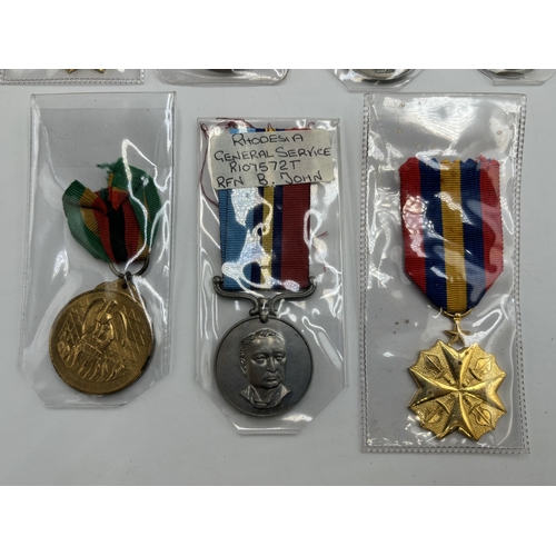 2344 - Seven African military medals to include Rhodesian General Service presented to R107572T RFN. B. Joh... 