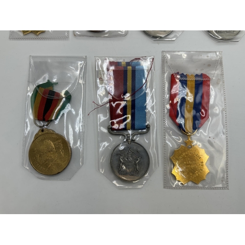 2344 - Seven African military medals to include Rhodesian General Service presented to R107572T RFN. B. Joh... 