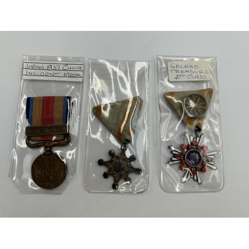 2347 - Three Japanese military medals, one 1937-1945 China Incident, Order of the Sacred Treasure 4th Class... 