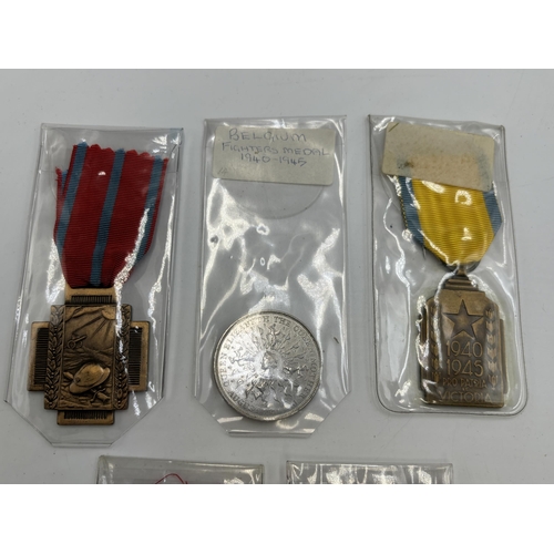 2348 - Five Belgium military medals to include 1940-1945 Fighters, 1940-1945 Colonial War, 1914 - 1918 Fire... 