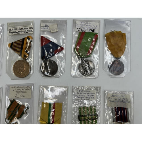 2352 - Seventeen European military medals to include Austrian WWI Bravery, 1873 Austro-Hungary General Camp... 