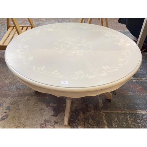 100 - An Italian style white painted circular pedestal coffee table - approx. 51cm high x 99cm diameter