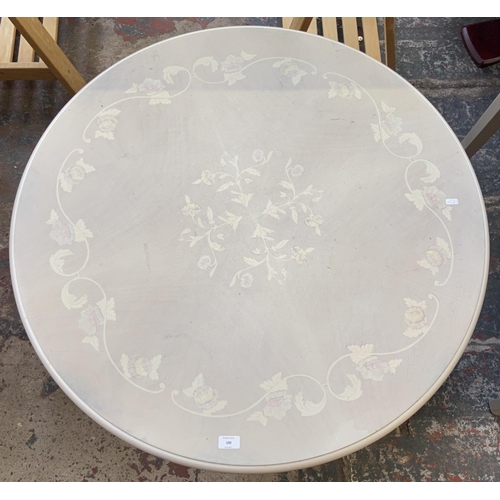 100 - An Italian style white painted circular pedestal coffee table - approx. 51cm high x 99cm diameter