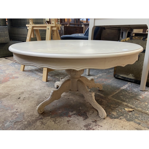 100 - An Italian style white painted circular pedestal coffee table - approx. 51cm high x 99cm diameter