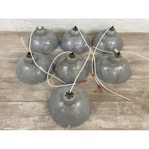 101 - Seven mid 20th century grey painted enamel pendant light shades - approx. 32cm diameter