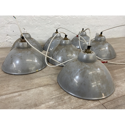 101 - Seven mid 20th century grey painted enamel pendant light shades - approx. 32cm diameter