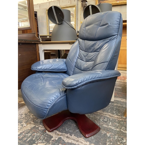 109 - A Stressless style blue leather swivel reclining armchair