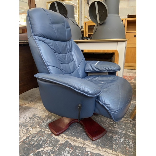 109 - A Stressless style blue leather swivel reclining armchair