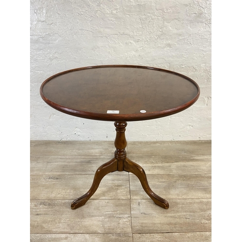 11 - A burr walnut and mahogany circular tilt top tripod pedestal occasional table with bird cage mechani... 