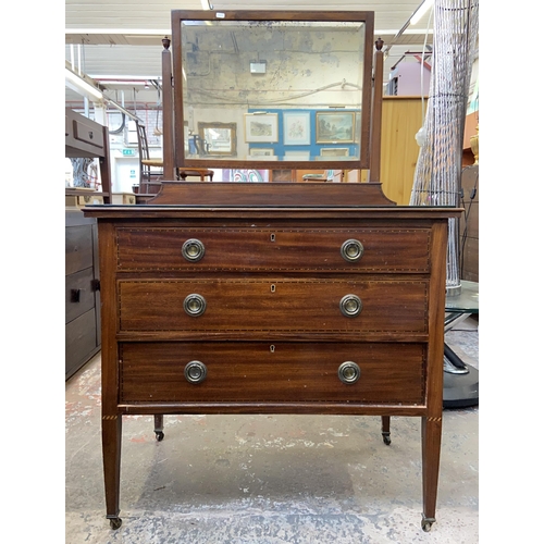 110 - An Edwardian inlaid mahogany dressing chest - approx. 138cm high x 84cm wide x 51cm deep