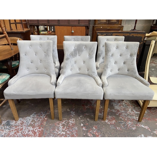 116 - Six modern grey buttoned fabric upholstered dining chairs on beech supports with metal studding