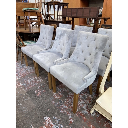 116 - Six modern grey buttoned fabric upholstered dining chairs on beech supports with metal studding