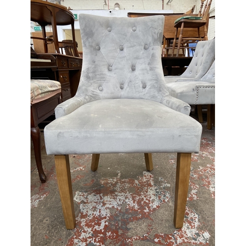 116 - Six modern grey buttoned fabric upholstered dining chairs on beech supports with metal studding