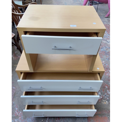 119 - Two pieces of modern white laminate and beech effect bedroom furniture, one chest of drawers and one... 