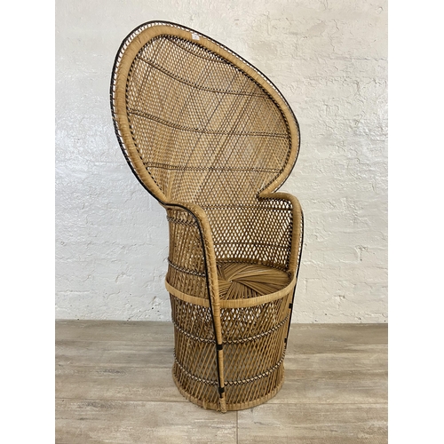 12 - A mid 20th century wicker peacock chair - approx. 134cm high x 91cm wide x 48cm deep