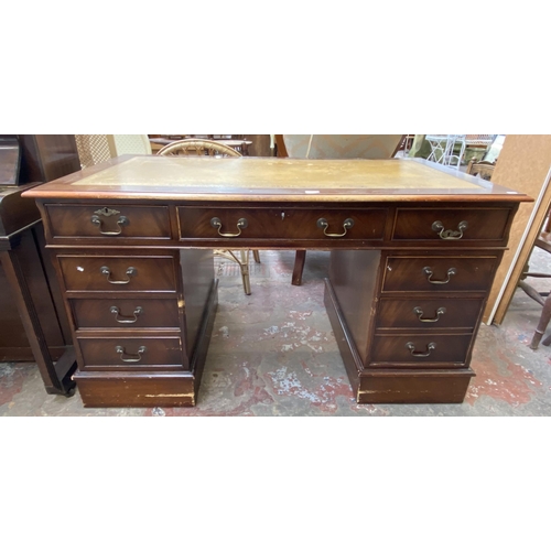 122 - A 19th century style mahogany and tan leather pedestal writing desk - approx. 77cm high x 136cm wide... 