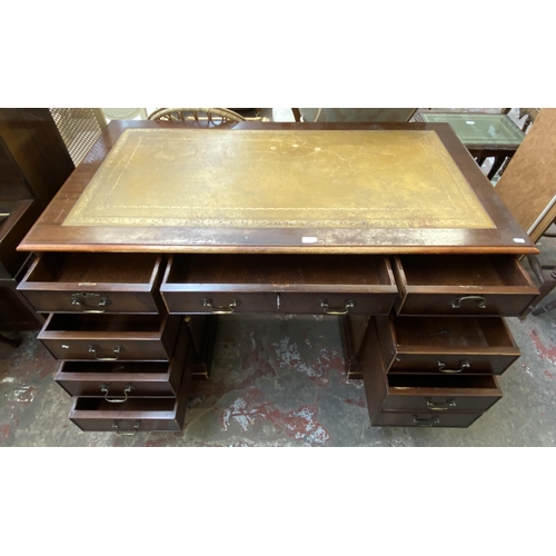 122 - A 19th century style mahogany and tan leather pedestal writing desk - approx. 77cm high x 136cm wide... 