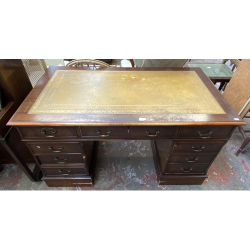 122 - A 19th century style mahogany and tan leather pedestal writing desk - approx. 77cm high x 136cm wide... 