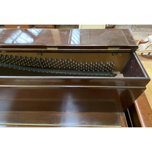 123 - An early 20th century Brinnie of London mahogany upright piano with stool - approx. 110cm high x 135... 