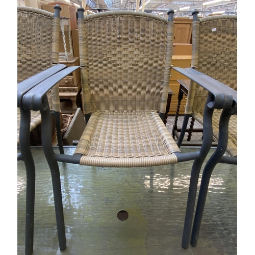 129 - A modern grey metal and plastic wicker effect six piece patio set comprising five chairs and rectang... 