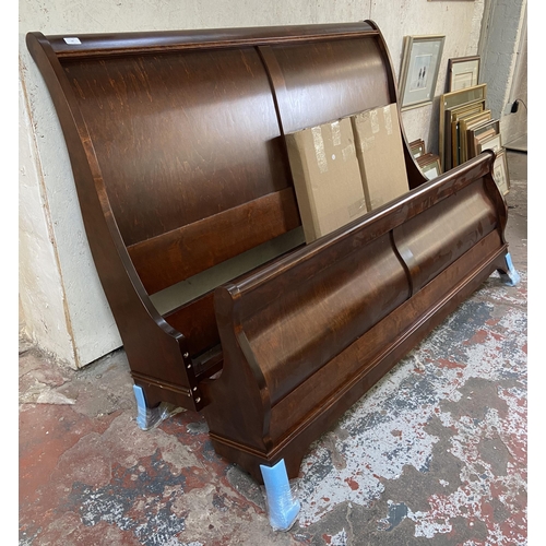 13 - A mahogany king size sleigh bed frame