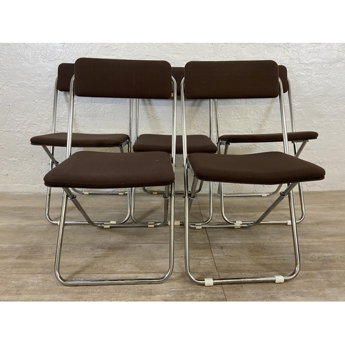 136 - Five mid 20th century brown fabric and chrome plated folding chairs