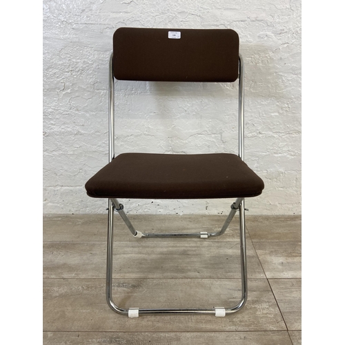 136 - Five mid 20th century brown fabric and chrome plated folding chairs