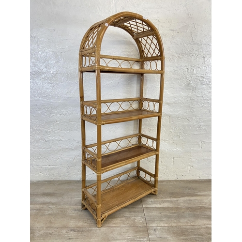 14 - A mid 20th century bamboo and wicker four tier bookshelf - approx. 140cm high x 61cm wide x 26cm dee... 