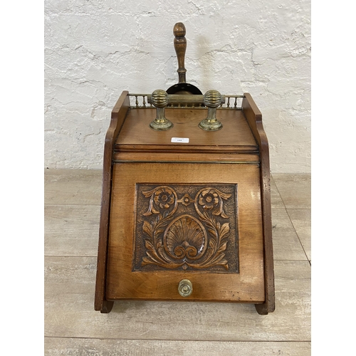 144 - A Victorian carved mahogany and brass coal scuttle with shovel - approx. 38cm high x 34cm wide x 45c... 